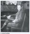 Wikariusz Ks. G. Hirschfelder w swym pokoju podczas lektury książki.